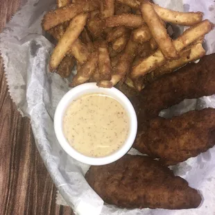 Chicken fingers with French fries and honey mustard