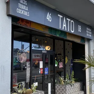 the front of a tattoo shop