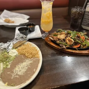 Trio Fajitas (more veggies than meat)with bean(nasty as hell)and rice