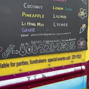 a chalkboard with a variety of different types of ice cream