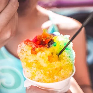 a woman eating an ice cream sundae