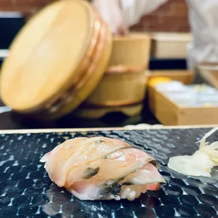 a sushi being prepared