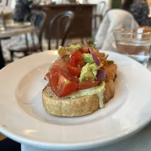 Avocado salmon tomato tartine