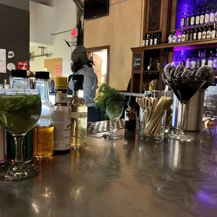a bar with a variety of drinks