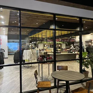 Front half of store (bottle shop, branded wear, bar accessories, variety of cocktail ingredients and tasting bar)