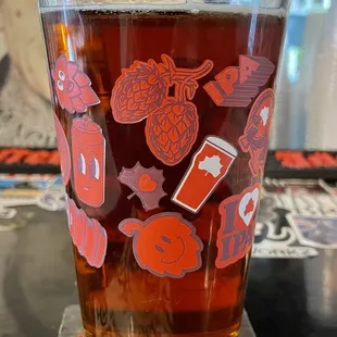 a pint of beer on a table