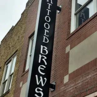 a sign on the side of a building