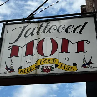 a sign for a tattoo shop