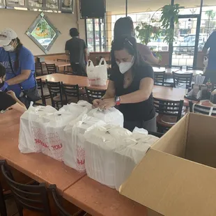 Project Comfort Houston partnered with Tau Bay to deliver hot meals to the elderly.