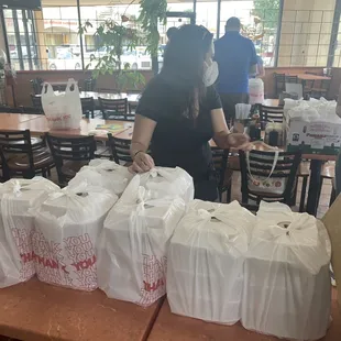 Project Comfort Houston partnered with Tau Bay to deliver hot meals to the elderly.