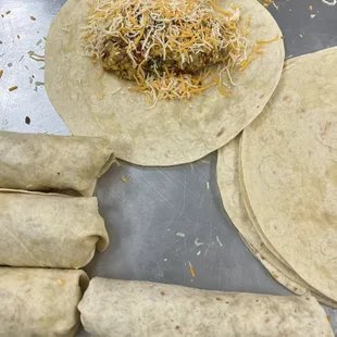 a variety of burritos