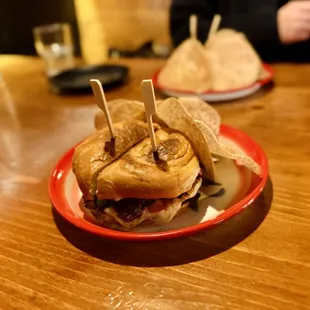 Lao Burger with taro chips - cut in half