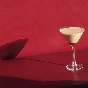 TAVA&apos;s Naughty Night Cap martini is made with Adult Chocolate Milk, Kahlua, Amaretto, and a splash of grenadine. A lovely drink!