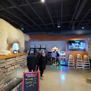 a polar bear on display in a restaurant