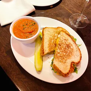 grilled cheese sandwich with pickle and tomato soup
