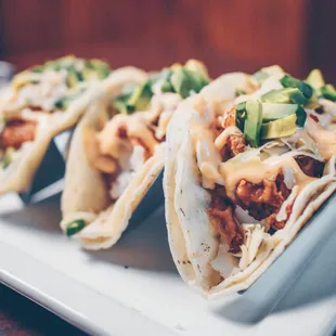 three tacos on a plate