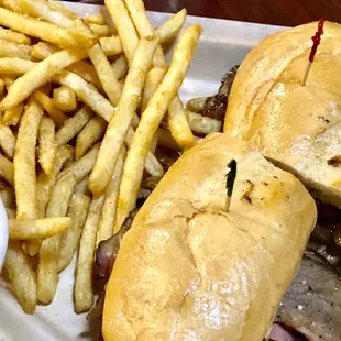 Sliced London Broil with Onions and Ghost pepper  Cheese.