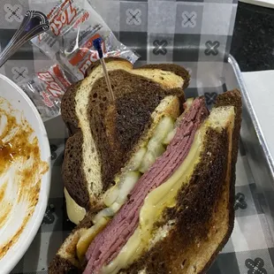 Thick pastrami sandwich