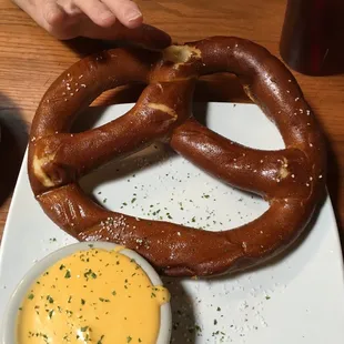 Jumbo soft pretzel with cheese sauce. Huge!