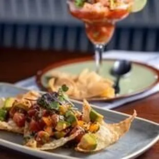 Ahi Poke with Avocado, Papaya, Serrano Chiles, Yuzu, and Crispy wontons