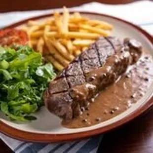 Prime 14 oz. New York Steak Frites with our Brandy Peppercorn Sauce