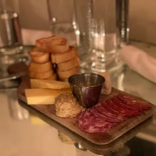 a platter of meat and cheese