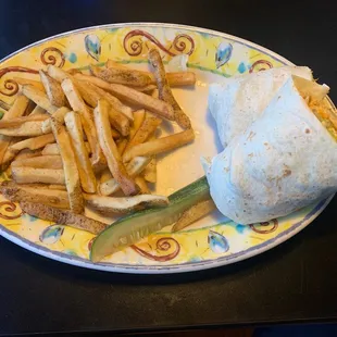 a burrito and french fries