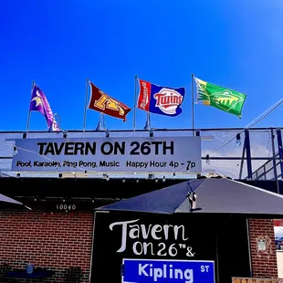 a sign for tavern on 26th