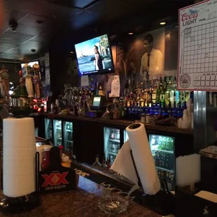 a bar with a lot of bottles