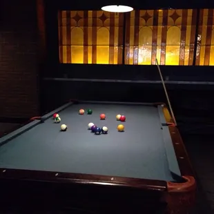 Quite a few pool tables