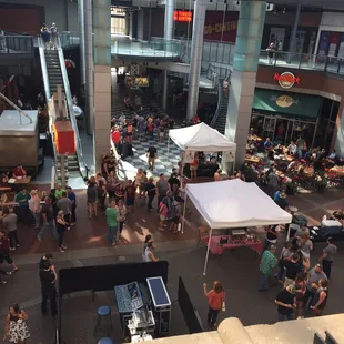 a crowd of people at tables