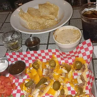 Chicken nachos and Pork Skins