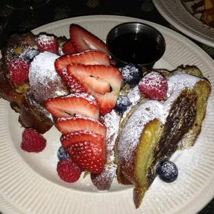 Challah French toast with mixed fresh berries and imported Vermont maple syrup!