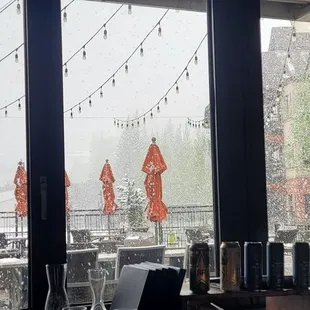 Snowing so hard outside in May, we could hardly see the slopes from the bar.