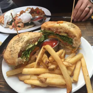 Foreground - Grilled Chix Avocado on Rosemary Foccacio. Background - Lobster Benedict.