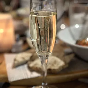 a glass of wine on a table
