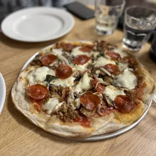 the pizza on the table