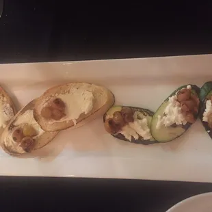 Crostini con Formaggio di Capra e Uva Arrosto : toasts with goat cheese and roasted grapes  (Grain free for me on toasted zucchini)