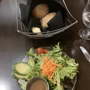 Side salad with Balsamic Vinaigrette and Bread Rolls. Both were delicious. The butter was creamy.