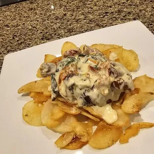 Tuscan sirloin over crispy potato chips