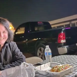 a man and woman sitting at a table