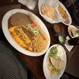 Refried beans, rice, beef taco, cheese enchilada and a chicken tinga roll up (like a taquito)