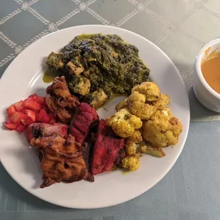 Weekend buffet. Saag paneer, pakora, cauliflower Gobi, chicken masala, onion chutney, chicken Tikka