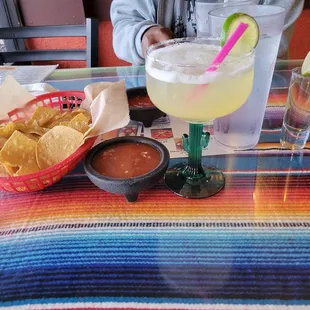 Reposado Lime Margarita yummy and strong  Chips and salsa are amazing, not too salty and just the right kick