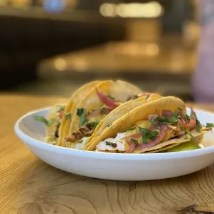 three tacos on a plate