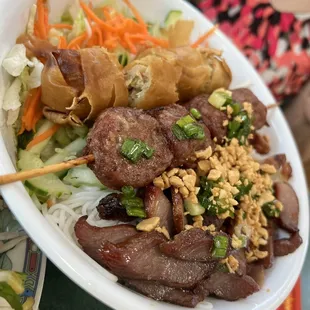 a plate of food with meat and vegetables
