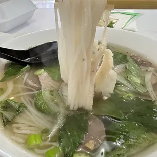 Good takeout @P1. House Special Pho (Rare beef, flank, brisket, tripe and meatballs)