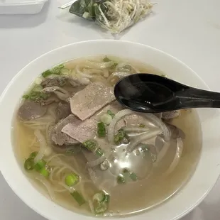 Takeout P1. House Special Pho (Rare beef, flank, brisket, tripe and meatballs)