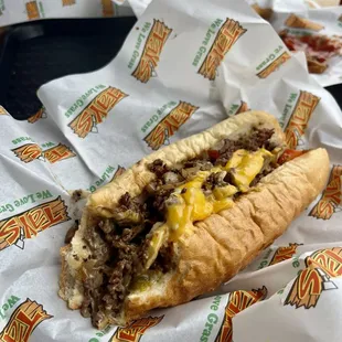 8" Cheesy Tay's with mushrooms, peppers and onions