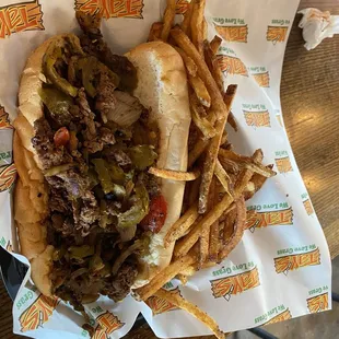 Tay's Beef Cheesesteak with hot peppers and seasoned fries